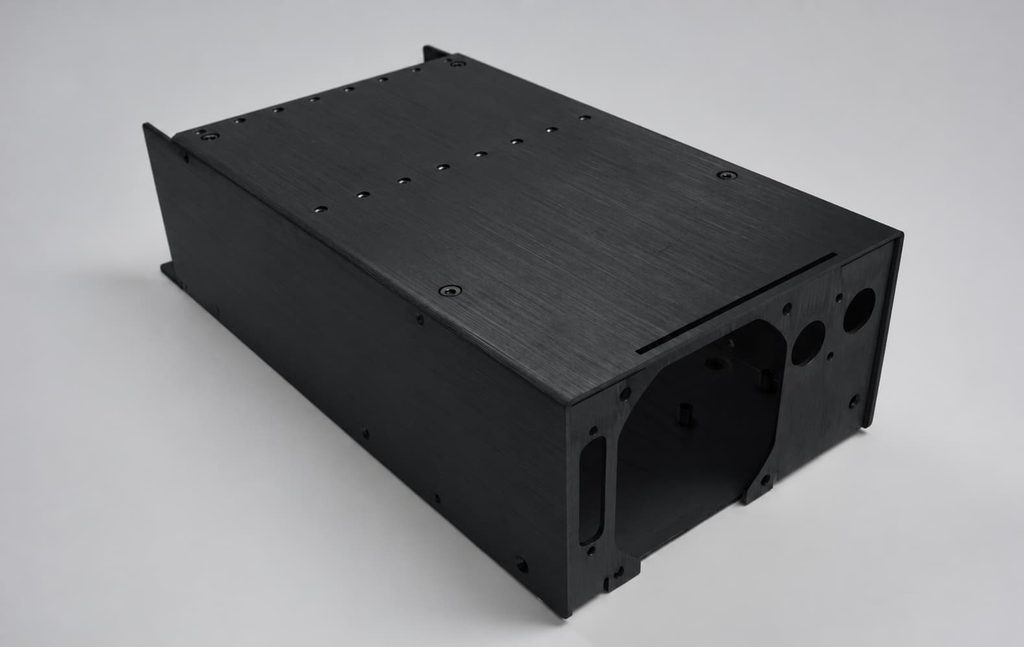 Black powder-coated sheet metal housing