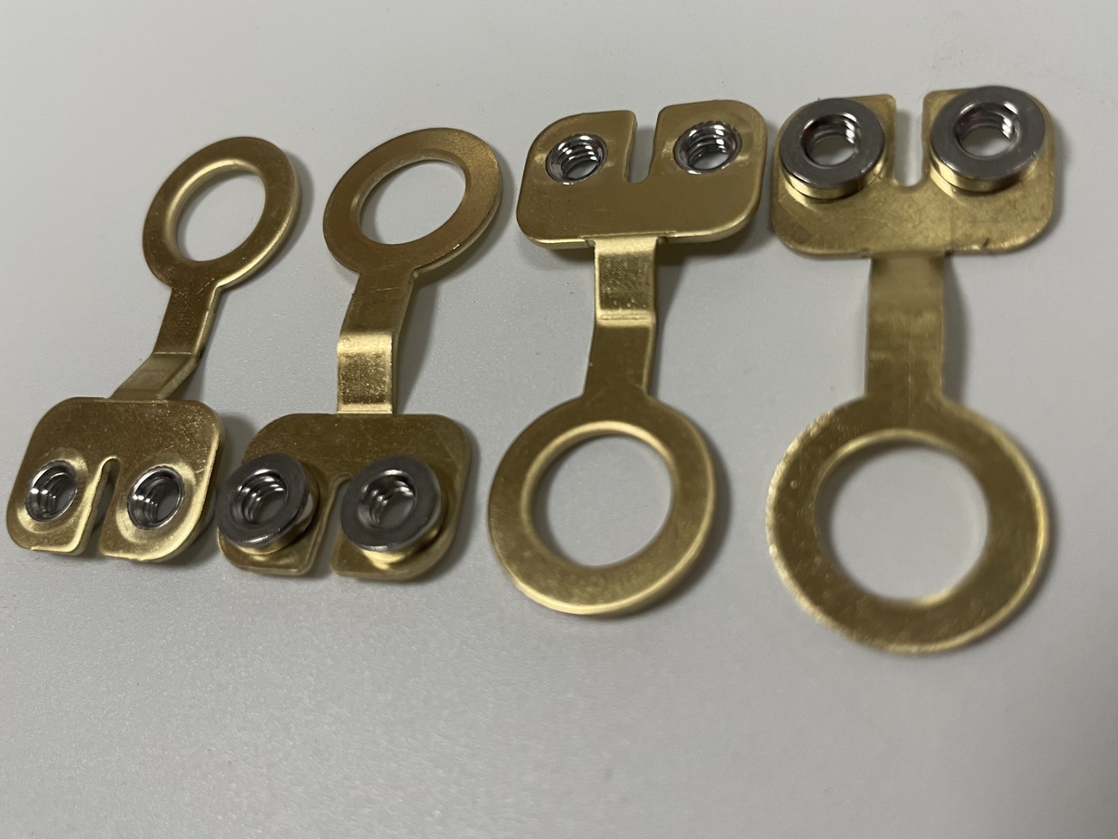 brass battery lugs - Lugs pre-assembled with screws through the two-hole pad.