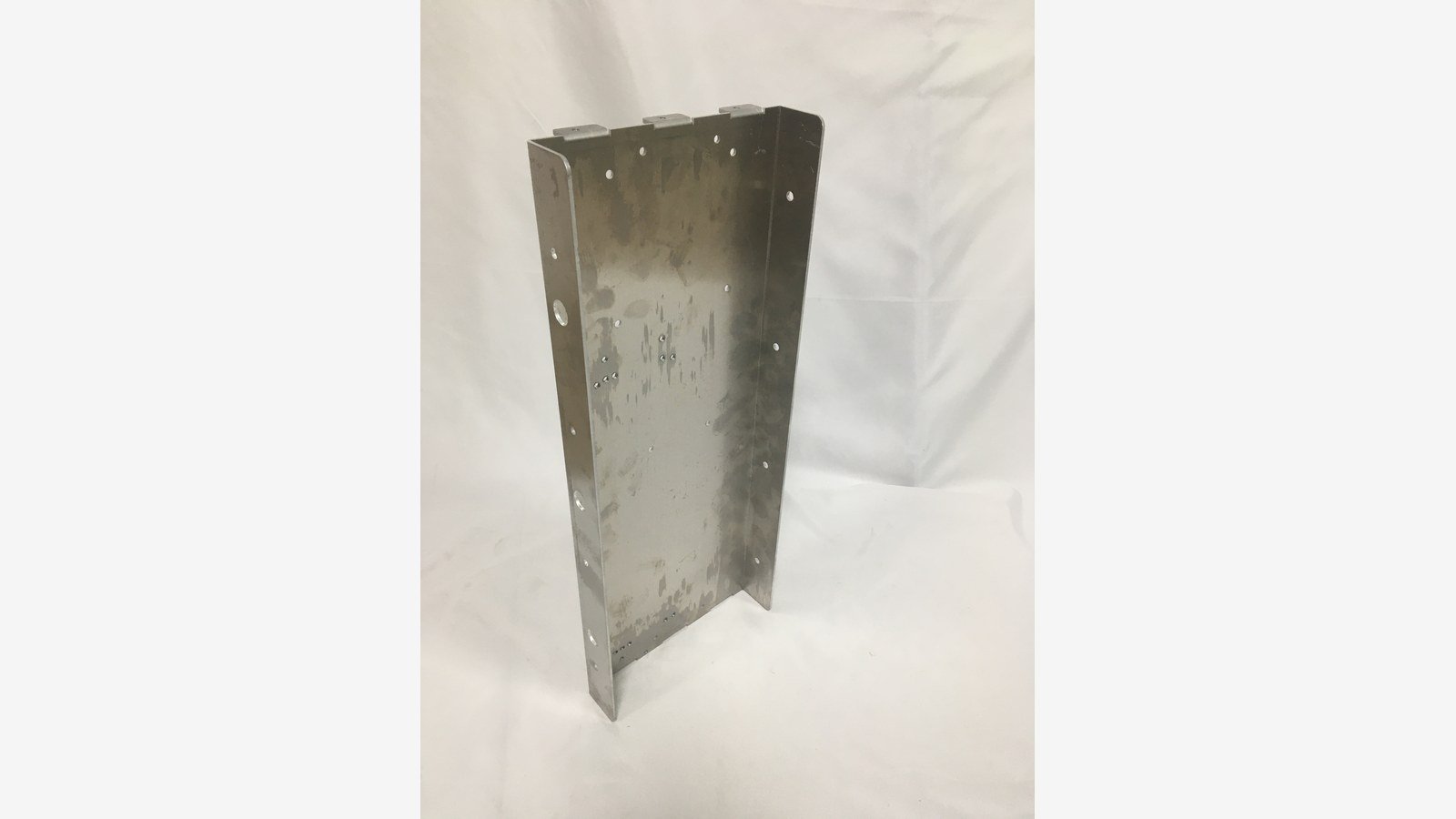 cnc punching service - A finished punched bracket ready for welding, showing flatness and burr-free punched edges.