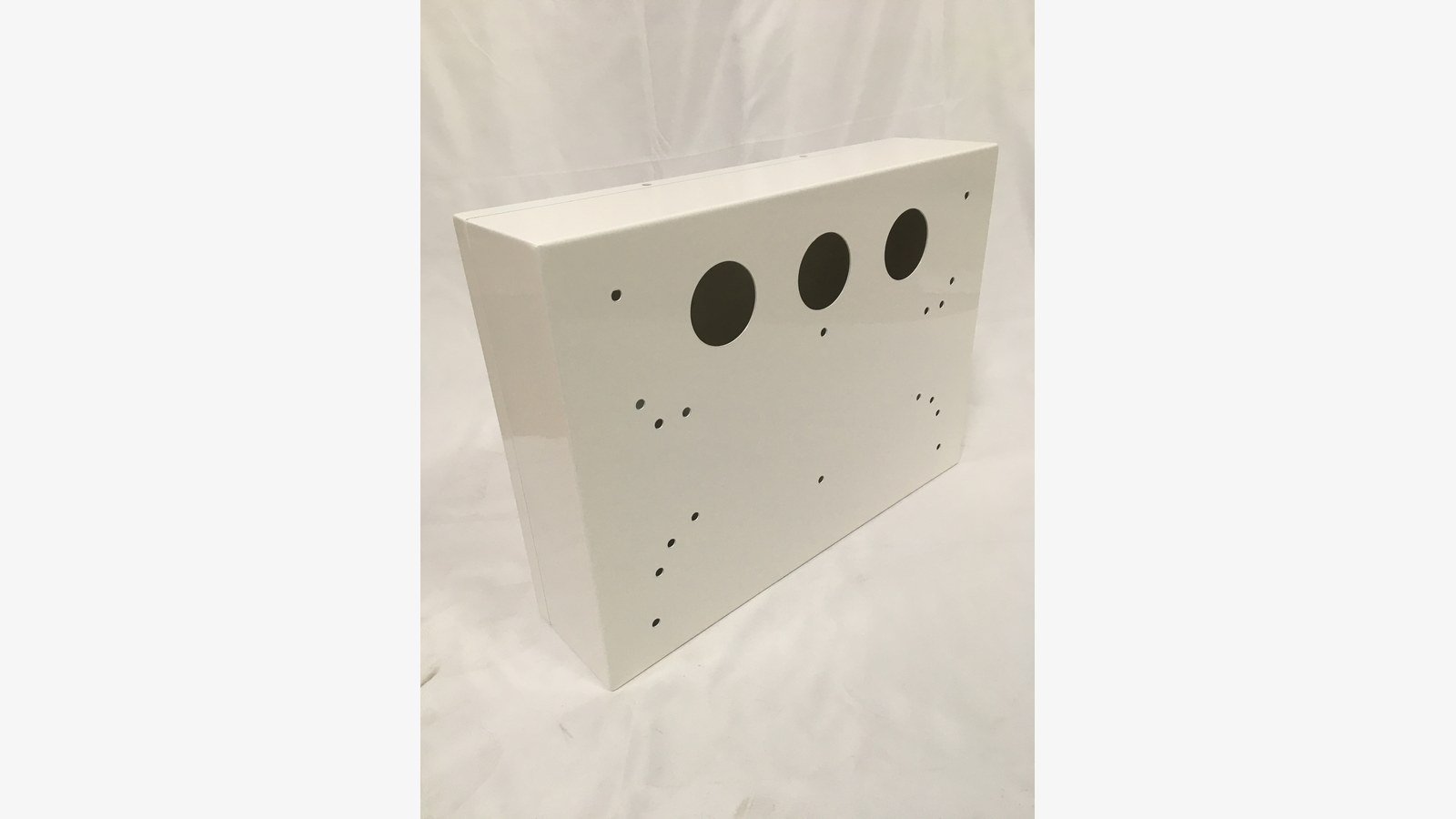 electronic metal housing - A powder coated electronic metal housing with cable-entry holes and fixing holes punched to drawing.