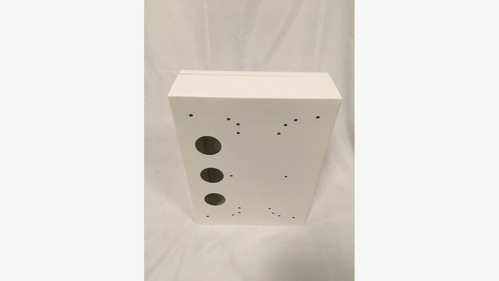 electronic metal housing - Front panel of a custom electronic housing with gland openings and fixing holes before assembly.