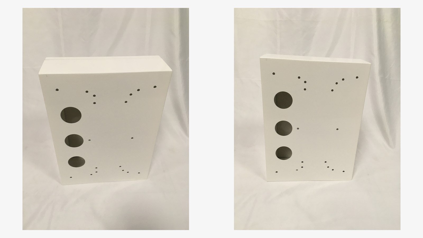 oem metal enclosures - Two powder coated OEM enclosures checked for hole position and finish before packing.