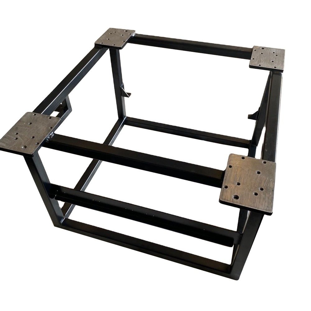 sheet metal welding - A welded square-tube frame with corner plates, checked for square before coating.