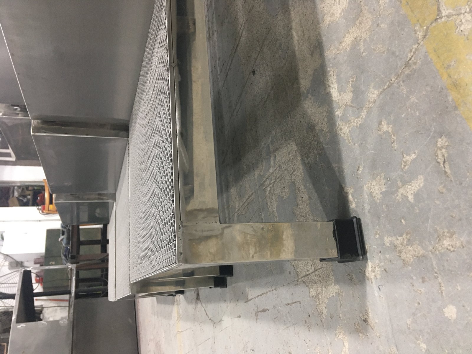 sheet metal welding - Stainless step unit with full welds dressed flush and the surface restored.